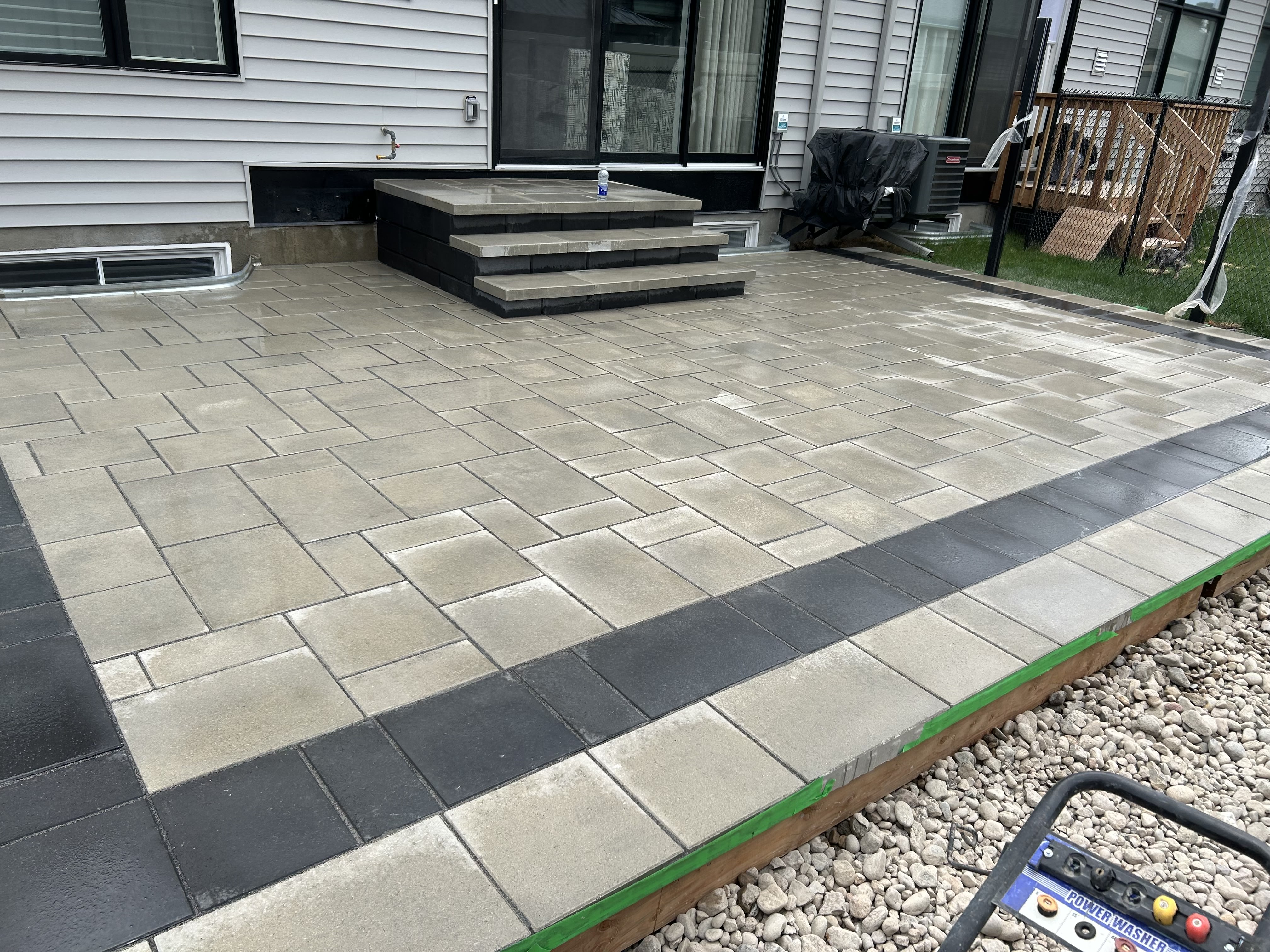 Backyard patio dark border Ottawa